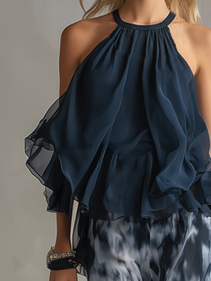 Isolde | elegante en chiffon con top de cuello alto y pantalones anchos estampados